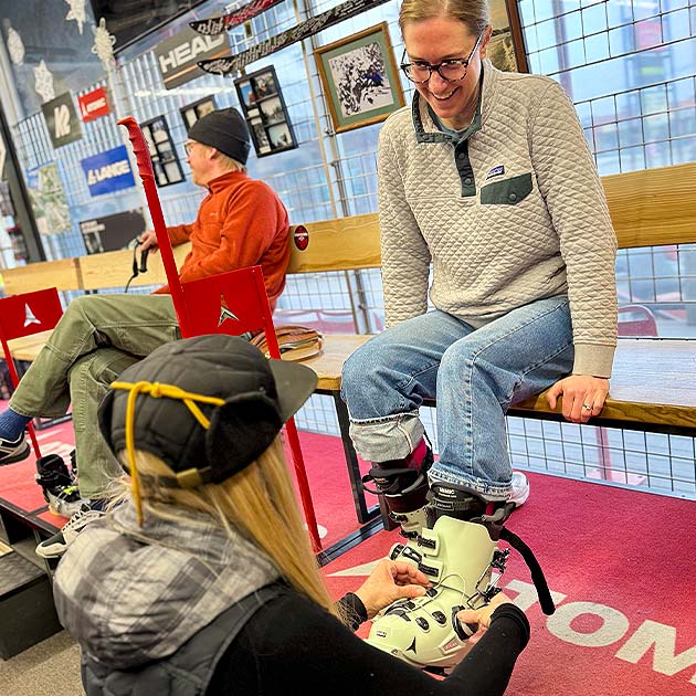 Getting boots fitted at The Creel in Spokane