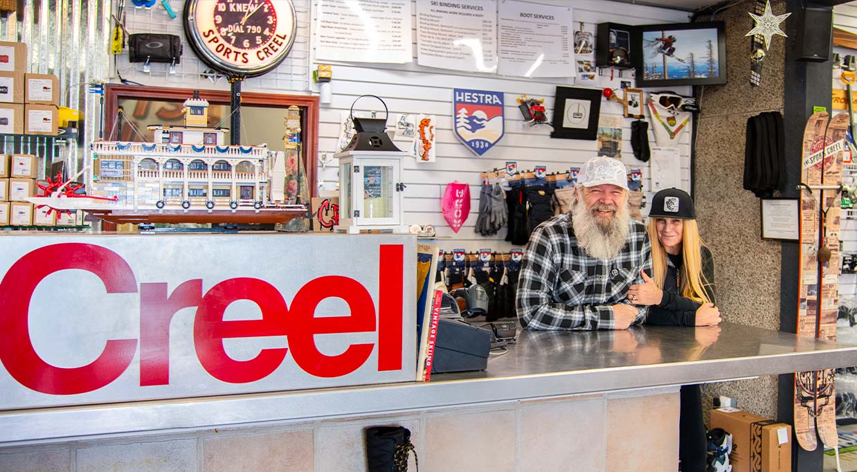 The Sports Creel Spokane Valley best ski shop in WA - the owners standing at the checkout smiling