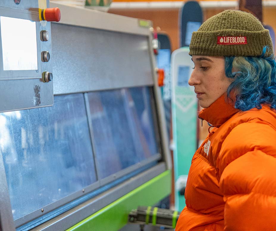 why ski tunning matters employee at the sports creel working on skis